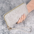 Light gray long zip wallet with embossed floral patterns and a wrist strap - Gray