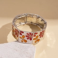Dettaglio del bracciale floreale retrò in lega d'argento con smalto rosso e arancione - Stile Base Argento Fiori Arancio Rossi Farfalla