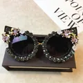 Baroque cat eye sunglasses with black frame, grey rhinestones, and pink crystal accents - Black Frame / Black Grey Rhinestone