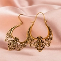 Detailed view of vintage hollow-out fan-shaped earrings on pink silk fabric background - Antique Gold (2769)