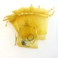 Yellow sheer organza drawstring gift bag for jewelry with elegant gold trim details - Gold; 5x7cm