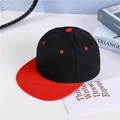 Classic black snapback hat with bright red flat brim and embroidered eyelets - M (56-58cm) / Red & Black