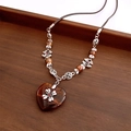 Retro Tiger Eye heart pendant necklace with silver floral details on a woven brown rope - 10# Necklace-Brown (Heart Pendant)