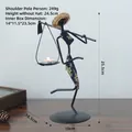 Porte-bougie créatif en fer avec chapeau de paille et tissu à fleurs bleu, style européen - Chandelier Figure de Porteur (Avec 1 Bougie)