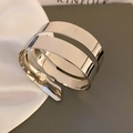 Macro detail of silver double-layered open bangle with a polished metallic finish - Silver Double Layer Ring Style
