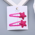Sparkly pink sequin star hair clips for girls in a wavy metal design on card - Rose Red Star Pair