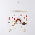 Handmade baby crib mobile with rainbow, wooden moon and stars hanging on white background - Orange Rainbow Star Moon Mobile