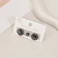 Lot de 3 boucles d'oreilles fleurs en acier inoxydable noir sur carte de support - Tournesol Noir