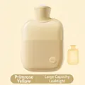 Primrose yellow PVC hot water bottle with anti-slip texture and plush cover - Basic Style - Primrose Yellow - Includes Fabric Cover / 500ml