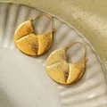 Exaggerated gold fan-shaped titanium earrings with textured radial grooves 3cm x 3.3cm - Gold Fan-Shaped Radiating Texture Earrings (NMSE-C558-2)