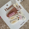 Close-up of cute felt bunny hair clip and brown clip with Good Luck embroidery - 2-Pack Cartoon - Rabbit