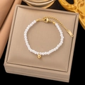 Elegant white pearl bracelet with gold K18 charm on luxury velvet display box - Pearl Bracelet / Gold