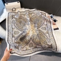 Detailed macro view of an elegant paisley silk scarf with vintage floral patterns and luster - 70*70cm / White Base Green Paisley