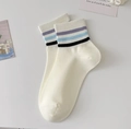 White crew socks featuring sporty purple and blue stripes in a minimalist college style - Three Stripes