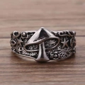 Vintage antique silver ring featuring embossed mushroom and star motifs on a textured band - US 5