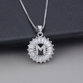 Silver letter M necklace featuring a round pendant with zircon stones on a box chain - Letter M / Silver