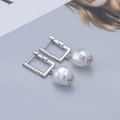 Detail of silver rectangular hoop earrings with zircons and baroque pearl charms - Irregular Pearl Earrings - Silver