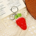 Handmade crochet strawberry keychain in red and green with a metal lobster clasp - Small Strawberry