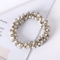 Close-up of handmade hair tie with white pearls and grey crystal beads on a book - 10# Grey Crystal Pearl Hair Tie