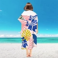 Hooded microfiber beach towel poncho featuring vibrant tropical leaf pattern print - Pullover Style - Colorful Large Leaves