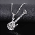 Macro shot of silver guitar pendant necklace with box chain over black reflection - Guitar Pendant