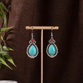 Detail of bohemian silver earrings with turquoise waterdrop stones and red beads - Blue Silver (E1111-1)