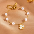 Golden stainless steel chain bracelet with white pearls and a clover charm pendant - White Shell Clover Pearl Bracelet