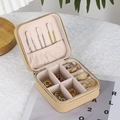 Portable beige jewelry box with light pink velvet lining for necklaces and rings - Beige