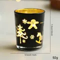 Black glass Christmas candle holder with warm LED lights and festive holiday laser cut patterns - Black Merry Hollow Glass Cup (No Candle)