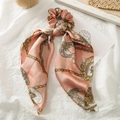 Detail of pink satin scrunchie with long ribbons and golden chain scarf print patterns - Pink Chain