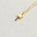 Elegant gold hammer pendant necklace featuring three sparkling inlaid green zircons - Small Key / Gold with Green Zircon