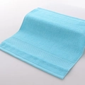 Soft light blue cotton square towel featuring a woven jacquard checkerboard pattern - 34x34cm / Sky Blue