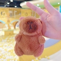 Close-up of cute brown plush capybara keychain featuring soft fabric and bead chain strap - Dark Brown Basic + Bead Chain