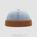 Detail of color-block kids docker hat with blue denim top and brown cotton brim - 52cm (3-6 Years) / Light Blue