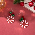 Detail of Christmas candy cane earrings with festive red and green metal bells and hooks - D1295 (Bell Lollipop)