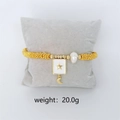 Gold beaded stretch bracelet with white enamel star charm, moon and pearl accents - White Star Charm Bracelet (Gold)