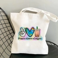 Witte Peace Love Coffee canvas draagtas met regenboog grafisch op een stoel - Kleurrijke Print Patroon Stijl (B100304-TBWH-M)