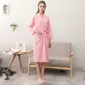 Pink waffle weave bathrobe for women with long sleeves and a matching waist tie - Pink (Women)