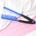 Blauw-zwarte V-vormige haarkam met clip voor professionele styling resultaten - Blauw