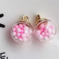 Pink and white foam beads inside a clear crystal glass ball pendant with gold metal loop - 1.6x2.2cm / Pink Ball