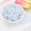 Blue frosted acrylic round beads for DIY bracelets and necklaces displayed in a white bowl - Dark Blue Frosted Round (110pcs)