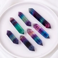 Polished natural rainbow fluorite hexagonal crystal pillars in purple and green tones - Rainbow Fluorite Double Pointed Column
