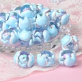 Macro detail of blue glass cat beads for DIY jewelry making on soft lace fabric - Transparent Blue Bead + Blue Rabbit Head / 18mm