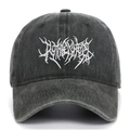 Close-up of gothic embroidery on washed charcoal grey cotton baseball cap with vintage texture - Army Green