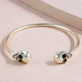 Minimalist gold skull open cuff bracelet with vintage punk aesthetic metal finish - Gold