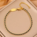 Titanium steel bracelet with golden beads and blue woven cord featuring a lobster clasp - Gold-Blue