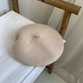 Classic beige wool beret hat in vintage style for women on white fabric seat - M(56-58cm) / Beige