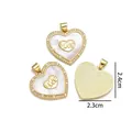 Golden heart pendant with LOVE engraving and white shell inlay, size 2.4cm x 2.3cm - LOVE Heart Mother of Pearl