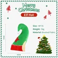 Christmas elf hat with festive red and green spiral pattern and a white pompom - Elf Hat