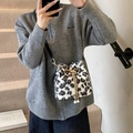 Faux fur leopard print bucket bag with gold chain drawstring and pearl detail - 19*15*18 / Black Lamb Wool